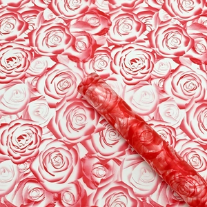 Detail of red and white rose pattern waterproof flower wrapping paper rolls