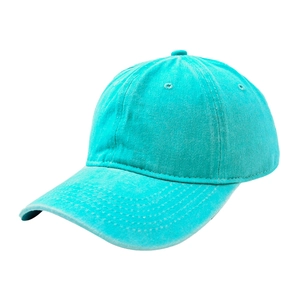Detail of teal washed cotton baseball cap showing fabric texture and embroidery patch