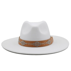 Detail of white wool jazz hat featuring a brown leather band with silver metal rivets