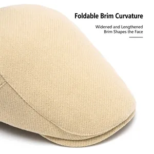 Classic beige wool blend flat cap with a wide curved brim and textured finish