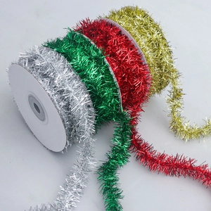 Christmas metallic tinsel garland rolls in silver green red and gold for DIY decor