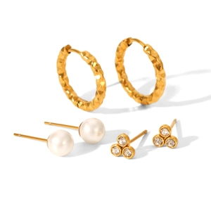 Three-piece earring set featuring gold hammered hoops, pearl studs, and crystal clusters