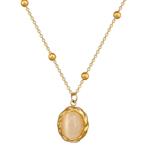 Minimalist gold titanium necklace featuring a rotating opal pendant with twisted metal border
