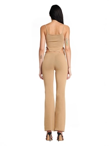 Two-piece khaki knit set featuring a backless crop top and high-waisted flared trousers
