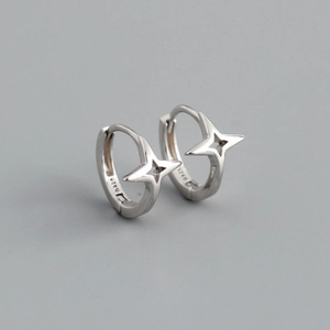 Macro shot of silver S925 hallmark on the inner band of the star huggie hoop earring