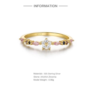 Close-up of S925 sterling silver floral ring with AAAAA zirconias and gold plating