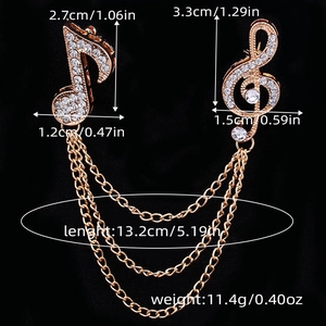 Detailed size map of golden musical note brooch with white rhinestones and triple chains