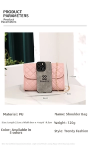 Pink quilted PU leather crossbody bag with gold chain strap shown on marble table