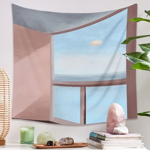 Détail d'une tapisserie bohème rose et bleue avec paysage océanique abstrait sur mur