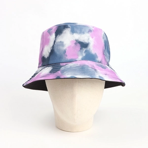 Detail of colorful tie-dye bucket hat with reinforced stitching on a model stand