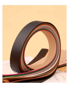 Close-up of vibrant candy-colored leather belts in various shades for women styling