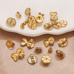 Golden stainless steel earring backs in butterfly and flower shapes for jewelry making