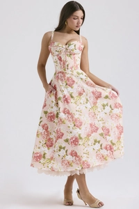 Detail of floral spaghetti strap maxi dress with lace hemline and hidden pockets