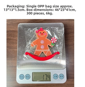 Close-up of a wooden gingerbread man Christmas ornament on a digital scale for weight measurement