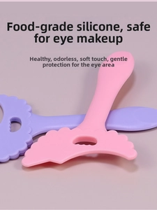 Silicone eyeliner auxiliary tool detail, soft pink and purple makeup shield for easy eyes.