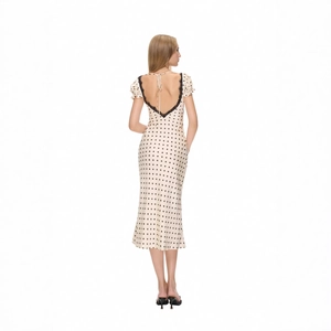 French vintage polka dot midi dress with black lace backless detail and neck tie
