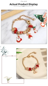 Detail of gold snake chain bracelets with Christmas enamel charms and floral beads