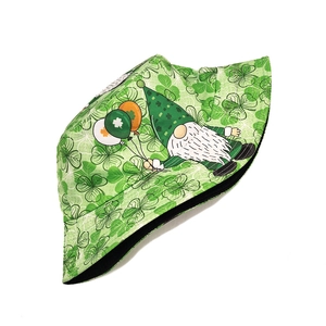 Close-up of St. Patrick's Day bucket hat with green shamrock and gnome print details