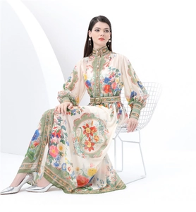 Detail showing high-neck vintage floral dress with long sleeves and a matching round buckle belt