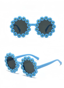 Front and side view of sky blue daisy shaped children sunglasses with grey lenses