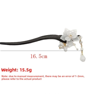 Detail view of Magnolia hair pin showing 16.5cm length and 15.5g weight specifications