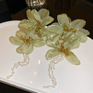 Green lace flower earrings with crystal fringe tassels for a vintage vacation look