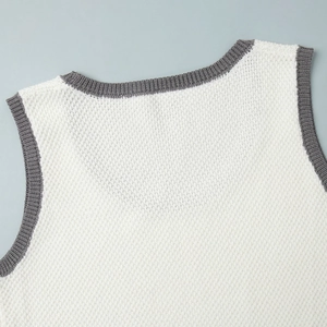 Detail of white honeycomb knit fabric with grey ribbed trim on U-neck summer vest