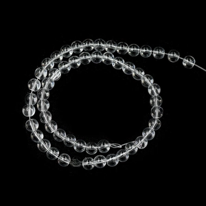 Macro shot of premium round clear crystal glass loose beads for DIY jewelry making