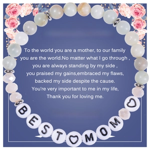 Amazonite bead bracelet with 'BEST MOM' letter beads on a floral greeting card for gift