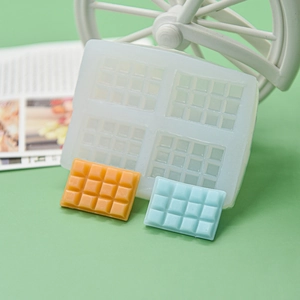 Detailed view of 4-cavity silicone chocolate mold with finished rectangle bars