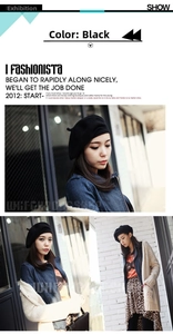 Close-up of a classic black wool beret cap shown on a model for casual autumn street style