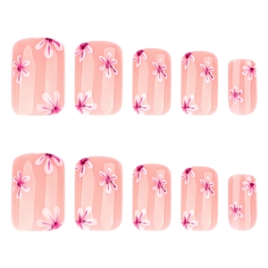 Pink press-on nails with fresh floral patterns in a minimalist short square shape