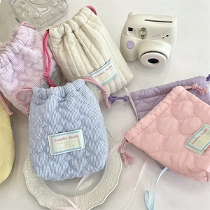 Quilted cotton camera pouch with heart patterns and drawstring closure for outdoors