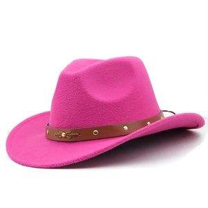 Detail of rose red felt cowboy hat with brown studded leather belt and bow detail