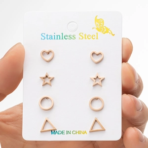 Set of 4 rose gold stainless steel geometric stud earrings including heart and star shapes