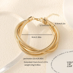 Detailed view of layered gold snake chain bracelet with adjustable clasp and dimensions