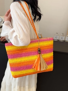 Rainbow gradient woven straw tote bag with colorful fringe tassel for summer beach vacations