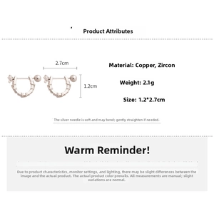 Detail view of U-shaped rose gold earrings with white zircon and measurement details