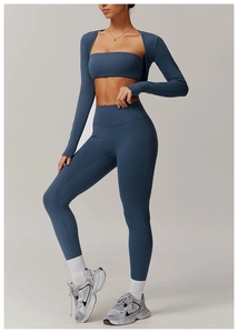 Three-piece yoga set in misty blue with zip cardigan, sports bra and high-waist leggings