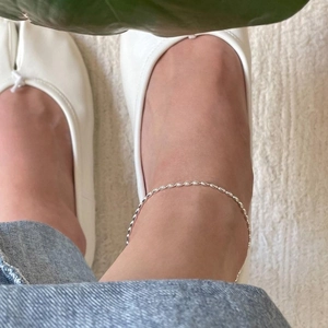 Delicate S925 sterling silver minimalist anklet worn on ankle with olive bead chain
