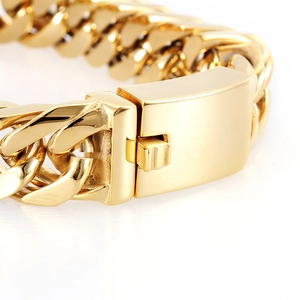 Macro close-up of 18K gold plated Cuban link bracelet with box clasp for men
