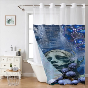 Detail of waffle weave shower curtain with fantasy underwater print and metal grommets