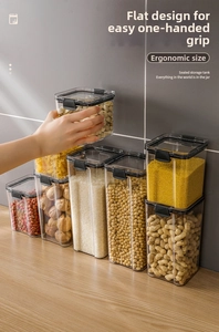 Close-up of food-grade airtight containers with black locking lids for grain storage