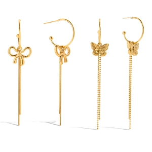 Gold bow earrings with long snake chain tassels displayed on a clean white background