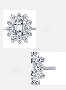Macro view of flower-shaped 925 sterling silver ring with 5A emerald-cut zircon and petals