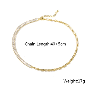 Detail of gold chain necklace showing rectangular zircons and clip link chain segments
