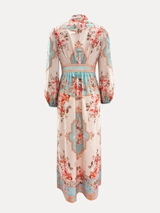 Rear view of long sleeve floral dress with high waist design and elegant print details
