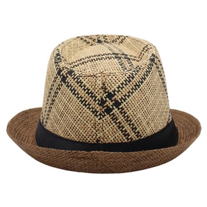 Close-up of checkered weave fedora crown with black ribbon and brown woven brim
