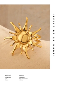 Detailed macro view of 18K gold plated sun flower ring with adjustable open band