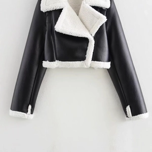 Women's black cropped faux leather biker jacket with white shearling lining and collar